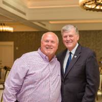 President Haas posing with a guest at Naples 2019